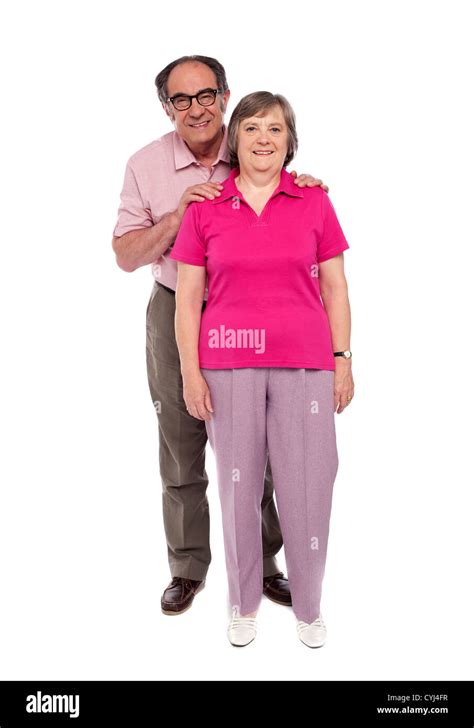 Full Length Portrait Of An Aged Love Couple Isolated Over White
