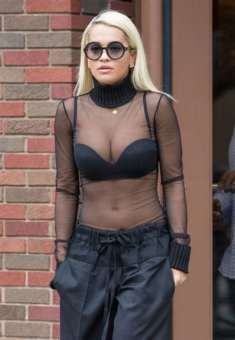 rita ora flashes major cleavage in racy sheer black top as she steps out in new york mirror online
