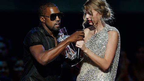 kanye west storms the vmas stage during taylor swift s speech