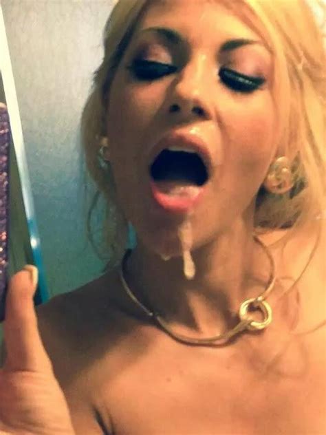 my slutty gf takes selfie with my cum on her face