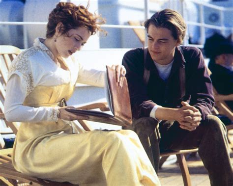 Titanic Kate Winslet Leonardo Dicaprio Seated On Deck As