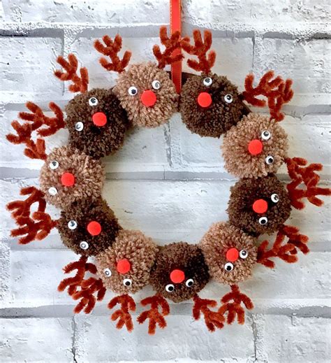 handmade christmas reindeer wreath etsy uk christmas pom pom crafts christmas wreaths diy
