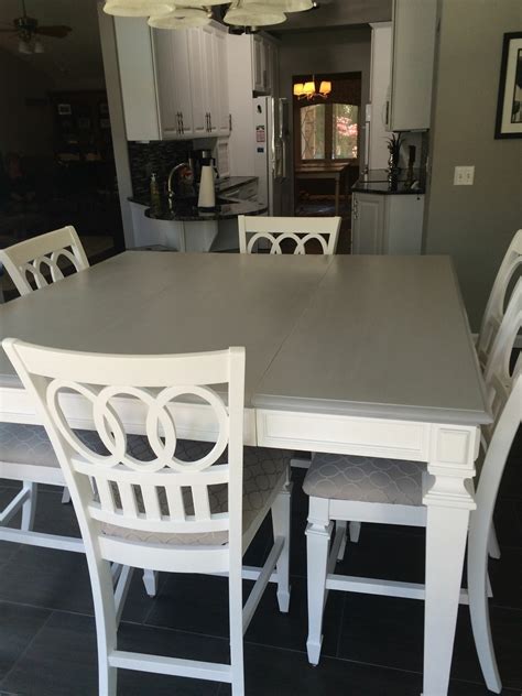 gray table top  white legs white chairs grey dining tables