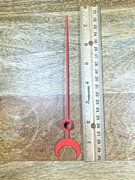 inches long clock hand  shaft diameter