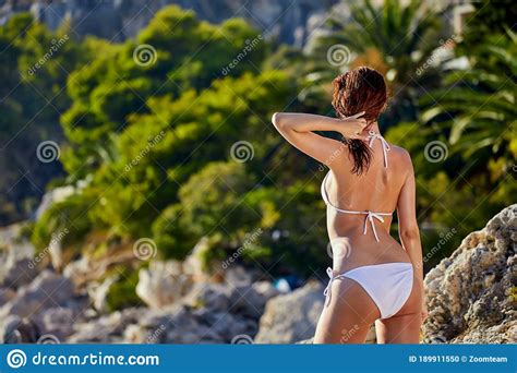 Back Of A Beautiful Woman In Bikini Croatia Coast Stock