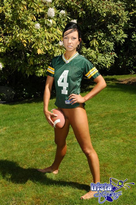 amateur model goes bottomless while throwing around a football