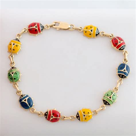 gold multi color ladybug bracelet  grams