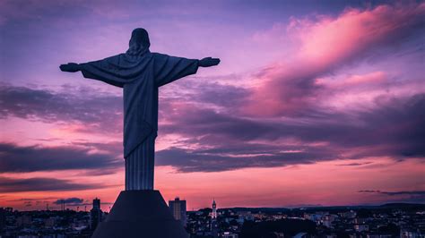 jesus sculpture  background  purple cloudy sky hd jesus