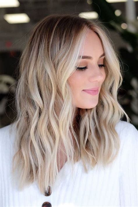 picture  rooty blended blonde hair  light waves