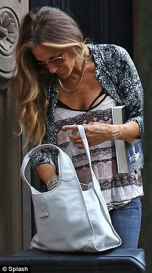 sarah jessica parker leaving her home carrying novel the bone clocks by david mitchell daily