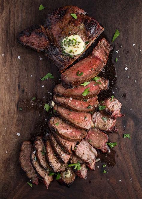 grilled sirloin steak topped  herb compound butter vindulge