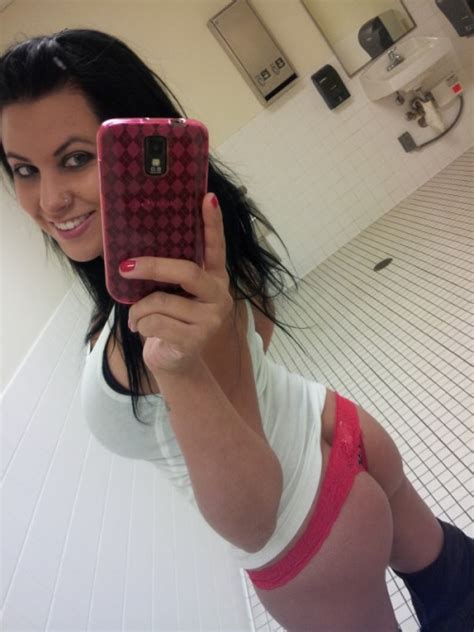 college chick snaps a selfie in a red thong freakden