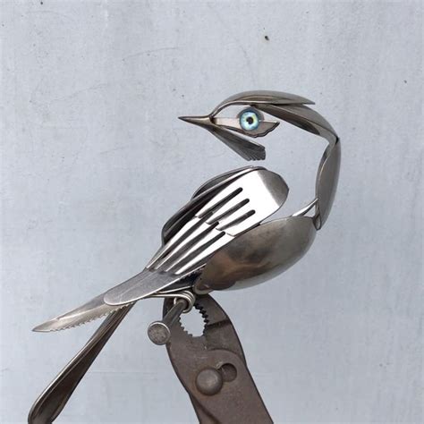 artist turns unwanted scrap metal  magnificent bird sculptures