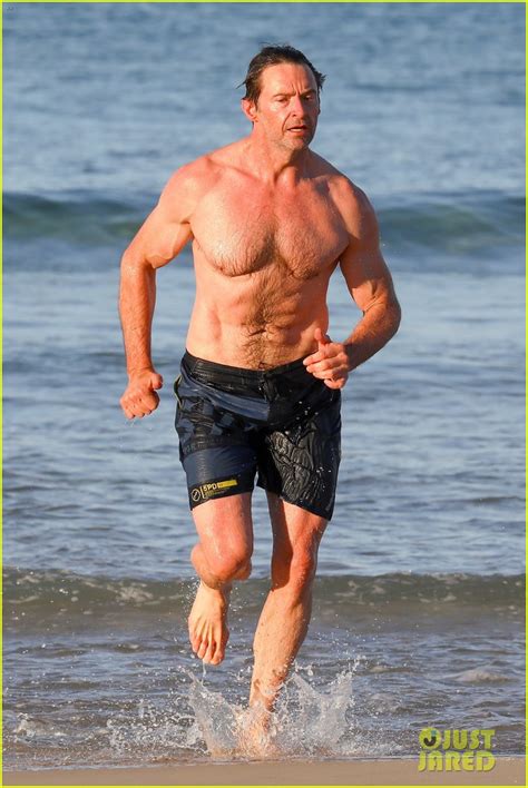 hugh jackman showers off his shirtless body after his beach workout
