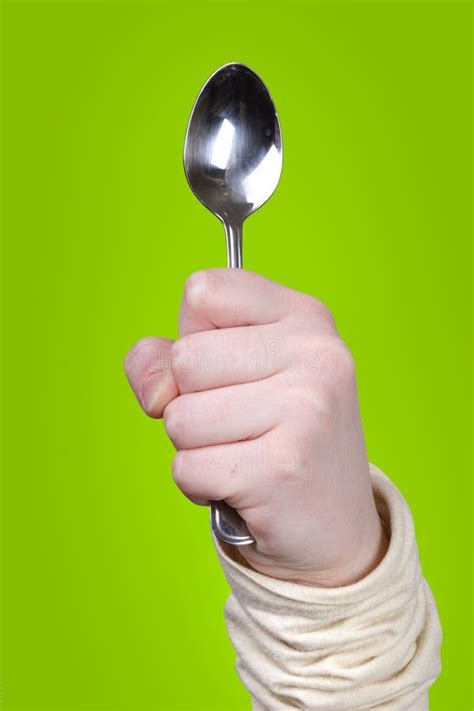 holding spoon stock photo image  background sleeve