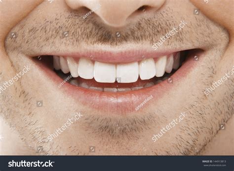 detailed image young man smiling perfect stock photo