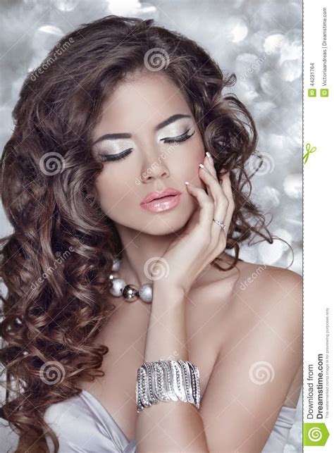 long wavy hair beautiful brunette woman with sensual lips make stock