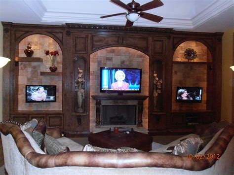 old world entertainment center beautiful built in love the stone backing living rooms