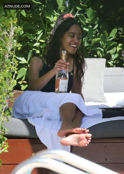 Malia Obama Wears A Black Swimsuit As She Drinks Wine With Friends By