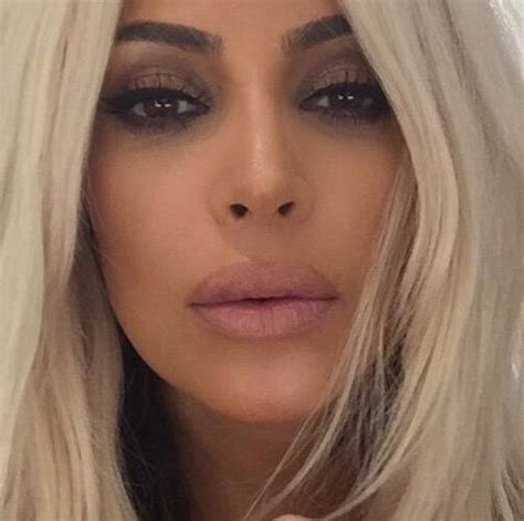 kim kardashian reveals her fuller lips in pouting selfie daily mail