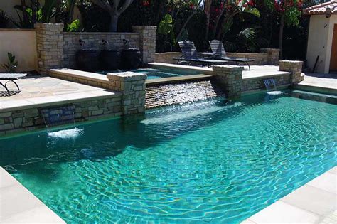 pool  spa  cascade waterfalls outdoor hardscapes