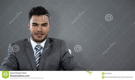 composite image  portrait  businessman typing  keyboard  desk