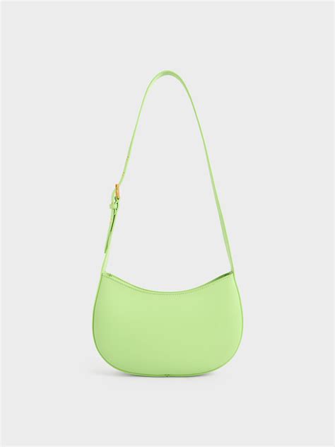 green curved shoulder bag charles keith mo