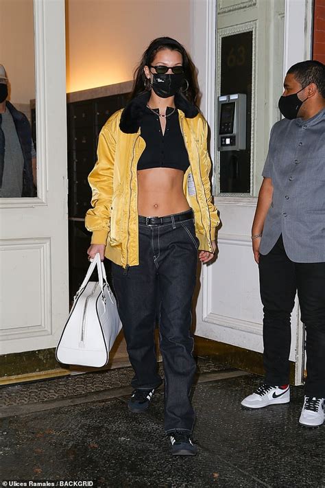bella hadid showcases her ripped abs in a tiny crop top daily mail online