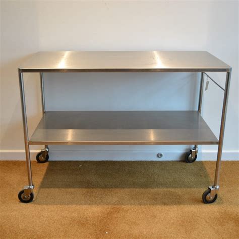 pre owned bristol maid ssteel dressing trolley xx  flat shelves photon surgical