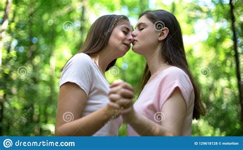 cute lesbians holding hands and kissing support despite society