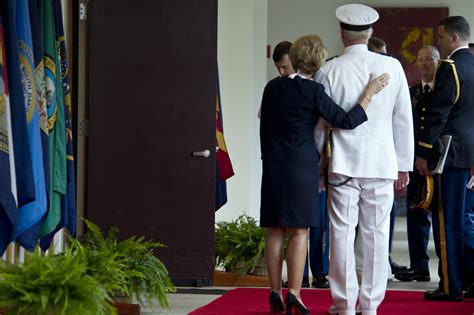donna willard comforts  husband navy adm robert  willard   retired
