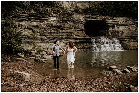 kissing on cliffs and waterfall frolics in this epic engagement shoot