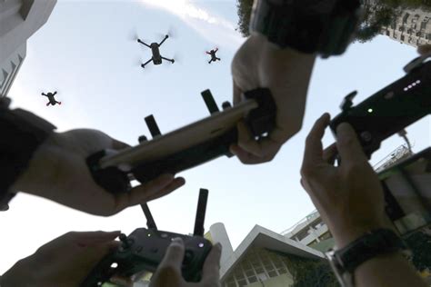 hong kong drone owners    pass tests  register