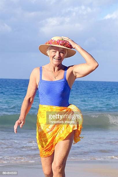senior woman swimsuit stockfoto s en beelden getty images