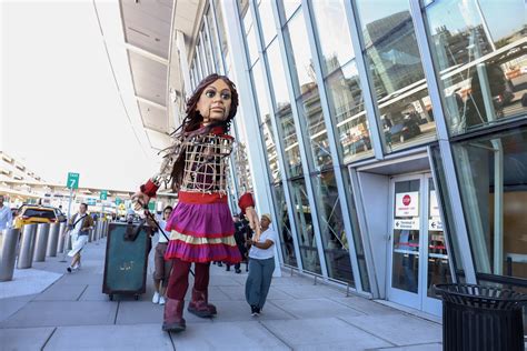 giant puppet   refugee girl      york public