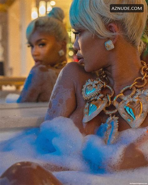 saweetie sexy poses naked in a bath in a new social media photoshoot in