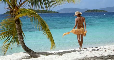 woman walking sarong  tropical beach stock footage video