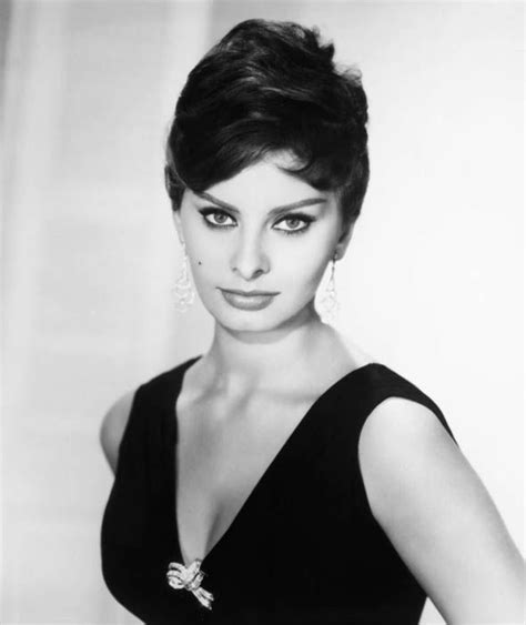 a stunning sophia loren poses for a portrait in a glamorous black dress