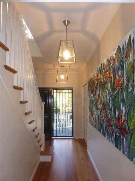 small entrance hallway slowly   adding  extra large pendant light  entrance