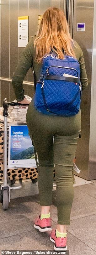 carol vorderman 58 flaunts those curves under unzipped military inspired jumpsuit daily mail
