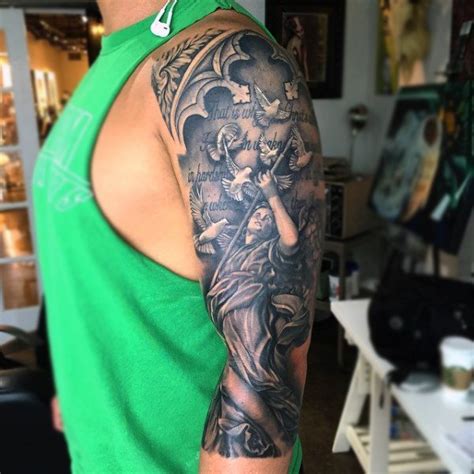 75 religious sleeve tattoos for men divine spirit designs