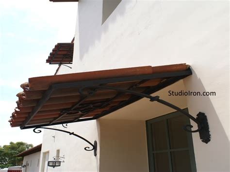 tiled roof  iron awning awnings pinterest discover  ideas  iron