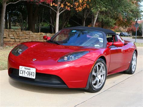 tesla roadsters    auctioned