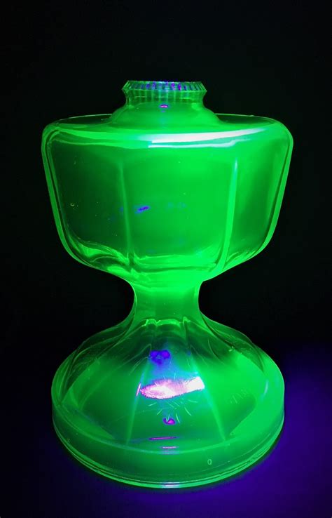 vintage uranium glass oil lamp base glowing green glass giant oil