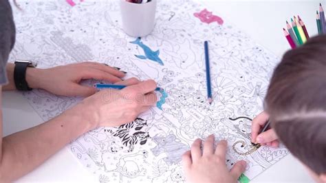 mother  son coloring pages  color pencils stock footage video