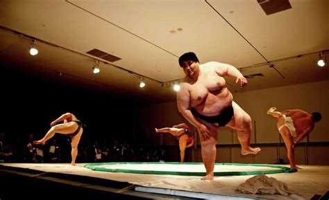 sumo wrestlers duke it out for the menil