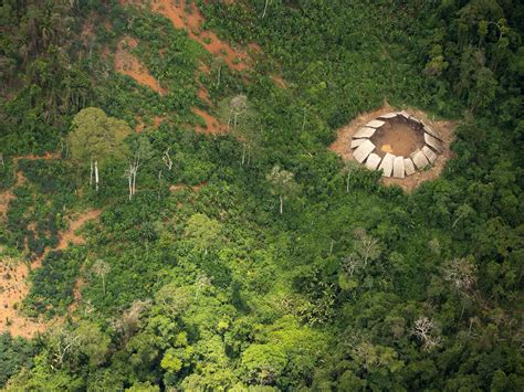 photos emerge of an uncontacted amazon tribal community in brazil threatened by illegal gold