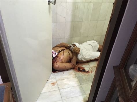 tortured dead body found in bathroom with hands and feet tied up