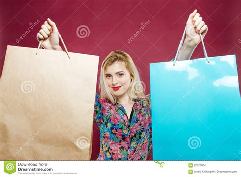 Beautiful Woman With Long Hair Is Enjoying Shopping