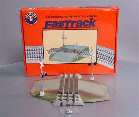 buy lionel   fastrack grade crossover wflasher  trainz auctions